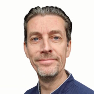 Headshot of James Lewis, a white male with short graying hair and a goatee style beard.